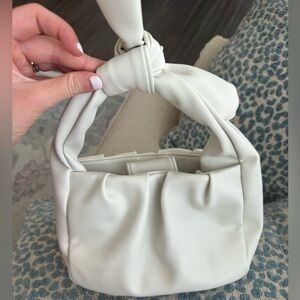 Anthropologie white crossbody bag

Great condition